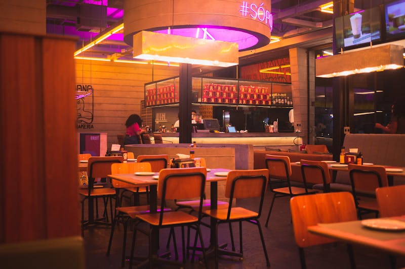 Warm and inviting Imos Pizza restaurant interior with classic decor