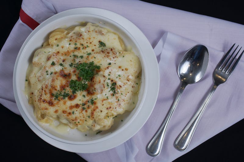 Corporate catering event with Imos Pizza serving a large group